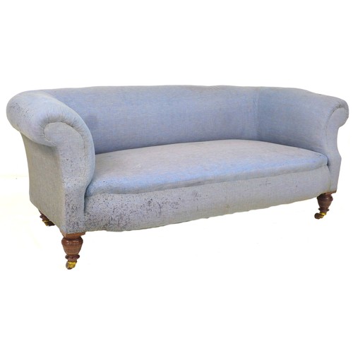 293 - A Victorian Chesterfield two seater settee, upholstered in pale blue fabric, with turned mahogany le... 