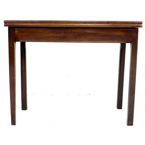 241 - A Victorian mahogany tea table, fold over surface, single frieze drawer with turned handle, raised o... 