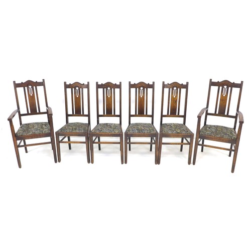 266 - A set of six Edwardian oak dining chairs, 45 by 45 by 106cm high, including two carvers, 54.5 by 54 ... 