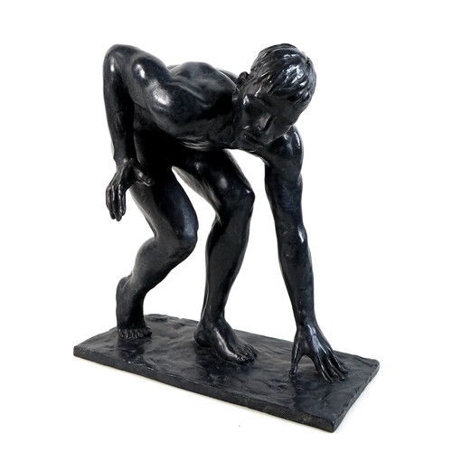 85 - Ian Rank-Broadley FRBS (British, b. 1952): 'Crouching Youth', a bronze figural sculpture, with dark ... 