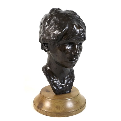 79 - Neil Godfrey (After Vincenzo Gemito): 'Head of a Boy', a bronze bust with a golden brown patina, sig... 