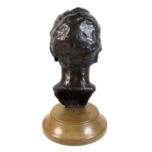 79 - Neil Godfrey (After Vincenzo Gemito): 'Head of a Boy', a bronze bust with a golden brown patina, sig... 