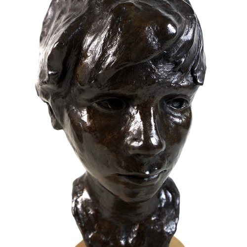 79 - Neil Godfrey (After Vincenzo Gemito): 'Head of a Boy', a bronze bust with a golden brown patina, sig... 