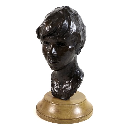 79 - Neil Godfrey (After Vincenzo Gemito): 'Head of a Boy', a bronze bust with a golden brown patina, sig... 