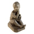 After Jean-Baptiste Pigalle (French, 1714-1785): a terracotta sculpture of a baby with birdcage, 20t... 