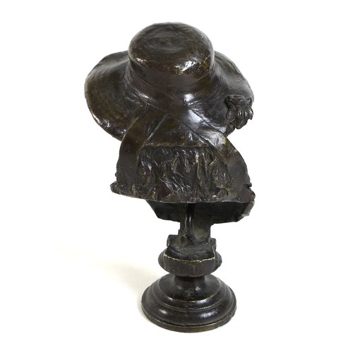 75 - A small bronze head and shoulders bronze bust of a youth wearing a hat, dark brown patina, 18.5cm hi... 