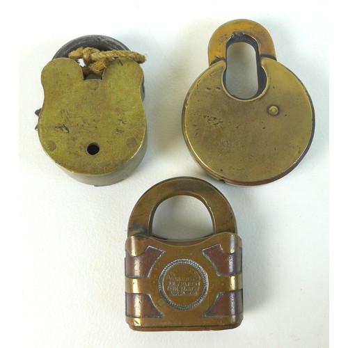 51 - A collection of antique metal and brass padlocks, some with keys, including 'Champion 6-Lever', 5.7 ... 