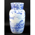 A Japanese Meiji Period porcelain lantern vase, finely decorated in underglaze blue with nine cranes... 
