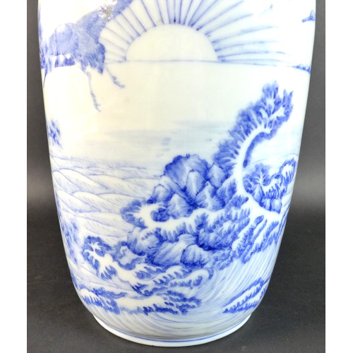 1 - A Japanese Meiji Period porcelain lantern vase, finely decorated in underglaze blue with nine cranes... 