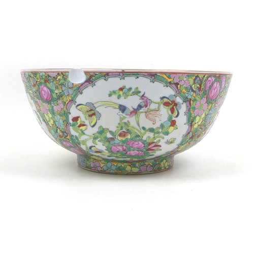 54 - A modern Chinese Canton porcelain bowl, 31 by 14cm high, containing a collection of ornaments, mostl... 