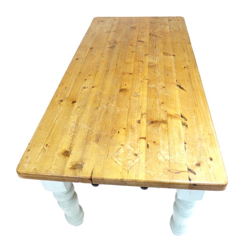 263 - A modern pine kitchen dining table, pale green painted legs, 91.5 by 183 by 79.5cm high together wit... 