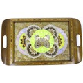 A vintage wooden tray, inset with an arrangement of butterfly wings behind glass, 28.5 by 47cm.