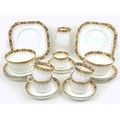 An Edwardian china part tea service, decorated with Imari style border and gilt highlights, includin... 