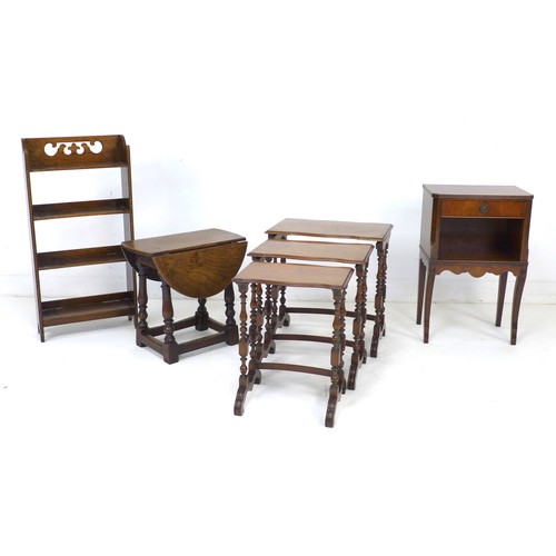 254 - A group of four pieces of furniture, comprising a nest of three mahogany tables with quarter veneere... 