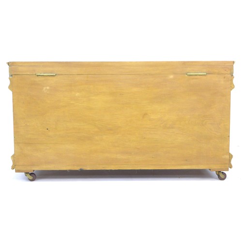 256 - A pine blanket chest, with metal carry handles to the sides, interior painted green, with lift out s... 