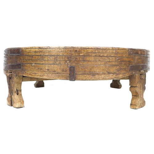 262 - A 19th century wooden barrel stand, of circular form, the shallow bowl with decorative bands to the ... 