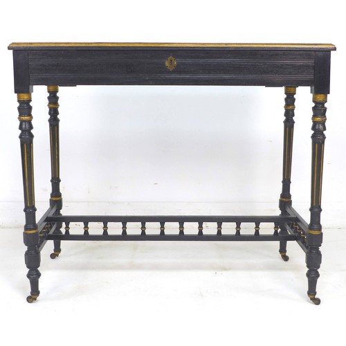 288 - A Victorian ebonised and gilt highlighted lady's writing desk, with lift top revealing a fitted inte... 