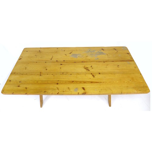 246 - A pine kitchen table, mid to late 20th century, with X frame trestle base, 90 by 183 by 76cm high.