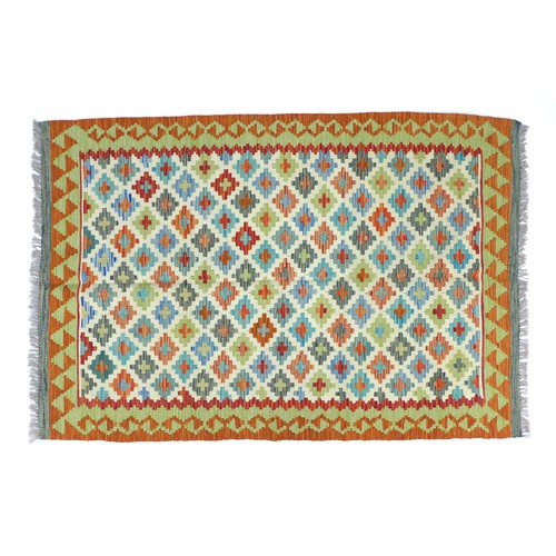 287 - A vegetable dyed wool Choli Kilim rug, with cream ground, multi coloured diamond patterned field, ge... 