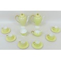A 1930s Wedgwood coffee set in lemon yellow, pattern no. 'W4098', comprising two coffee pots, both 1... 