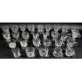A collection of clear glass custard cups, jelly or syllabub cups, mostly Victorian and later, includ... 