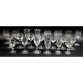 A collection of clear glass drinking glasses, mostly Victorian and later liqueur glasses, including ... 