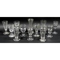 A small collection of clear glass drinking glasses, mostly Victorian and later, including dwarf ale ... 