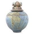 A large and impressive studio pottery jar and cover of ovoid form, the lid modelled as three women w... 