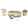 A group of four Studio Pottery items, comprising a Wolfscastle Pottery, Pembrokeshire shallow bowl w... 