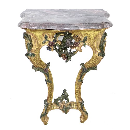 310 - An 18th century Continental marble topped giltwood pier table, possibly Italian, with polychrome pai...
