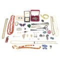 A group of vintage costume jewellery, including a marcasite set necklace, an Art Deco paste set broo... 