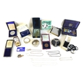 A collection of jewellery and lady's accessories, including a ruby eternity ring, set in white and y... 