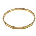 A 9ct gold bangle with faceted sides and Greek key engraved decoration, internal diameter 78.4mm, 10... 
