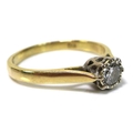 An 18ct gold and diamond solitaire ring, illusion set with diamond of approximately 0.25ct, 3.4mm di... 