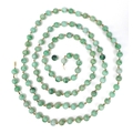 A string of one hundred and seven apple green jade beads, late 19th or early 20th century, a/f strin... 