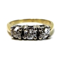 A 14k gold and diamond three stone ring, each stone of approximately 0.33ct, 4mm diameter by 2.66mm,... 