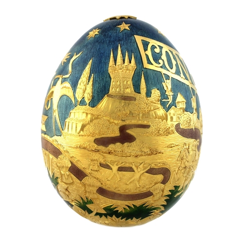 137 - A large 22ct gold Cadbury's 'Conundrum' egg, by Garrard & Co, London, finely engraved and enamelled ... 