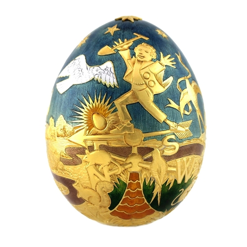 137 - A large 22ct gold Cadbury's 'Conundrum' egg, by Garrard & Co, London, finely engraved and enamelled ... 