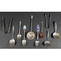 A group of ten silver items, comprising four sifter spoons, largest 15cm, commemorative George V Cor... 