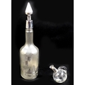 An Edwardian silver frosted glass decanter, with silver covered stopper and collar, as well as a lan... 