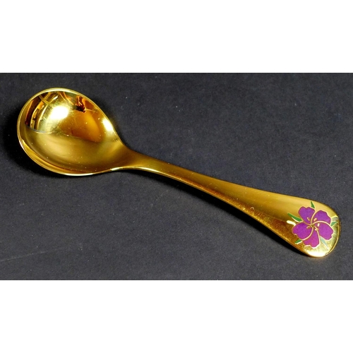 33 - A Georg Jensen gilt Sterling silver 1974 year spoon, with enamel corn cockle to its finial, Designed... 