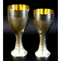 A pair of Christopher Nigel Lawrence limited edition modernist silver goblets, of waisted form with ... 