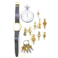 A group of watch keys, including a 14ct gold example engraved with a foliate design and set with a w... 