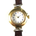 An Edwardian 18ct gold cased lady's wristwatch, circular white enamel dial, blue enamelled Arabic nu... 