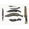 A group of knives, comprising three Kukris, largest with 34cm blade, 44cm overall, a GMR, number fou... 