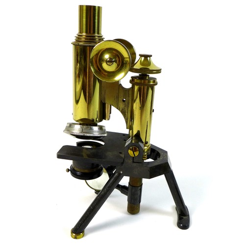 126 - A late Victorian brass compound microscope, J. Swift & Son, London, in fitted mahogany case, with va... 