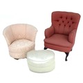 A buttonback armchair, in red upholstery, 65 by 90 by 95cm high, a tub chair, in pale pink upholster... 