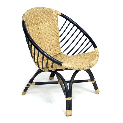 336 - A retro wicker and bentwood armchair, with black painted frame and wicker bound joints, 77 by 64 by ... 