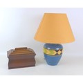 A late 20th century table lamp, with ceramic base, indistinctly signed, lamp base 18 by 25cm high, w... 