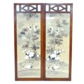 A mid century wooden screen, inset with a silk panel depicting cranes and bamboo with Mount Fuji in ... 